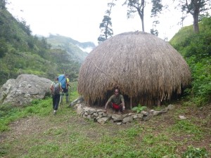 Dani Man in Traditional Hut